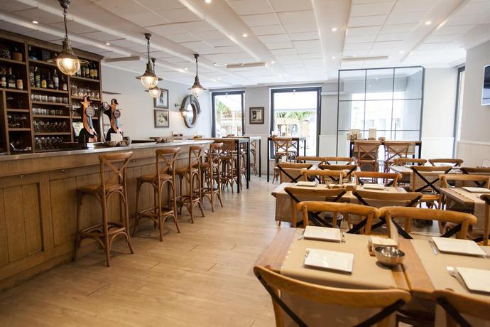 Imagen del bar/restaurante del Hotel Casa Roman. Foto 2