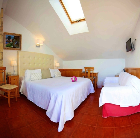 Imagen de la habitación del Hotel Casa Rosa. Foto 15