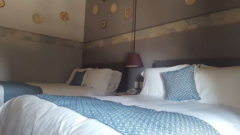 Imagen de la habitación del Hotel Casa Rosa Gran Boutique. Foto 7