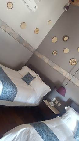 Imagen de la habitación del Hotel Casa Rosa Gran Boutique. Foto 8