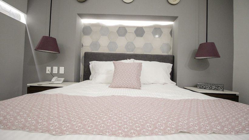 Imagen de la habitación del Hotel Casa Rosa Gran Boutique. Foto 9