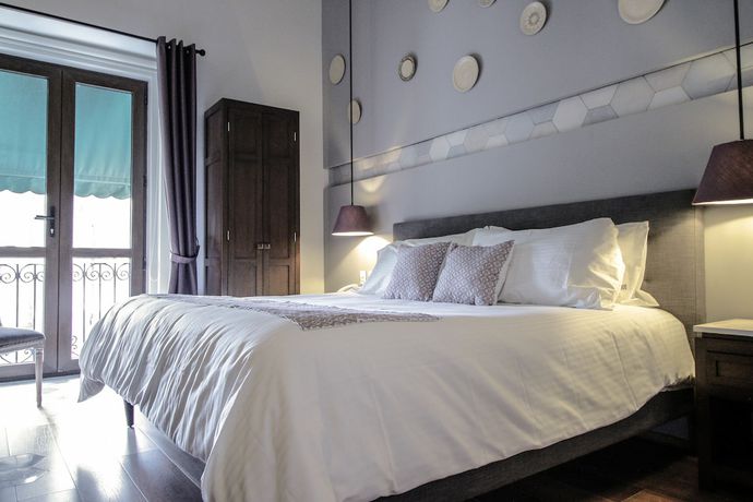 Imagen de la habitación del Hotel Casa Rosa Gran Boutique. Foto 10