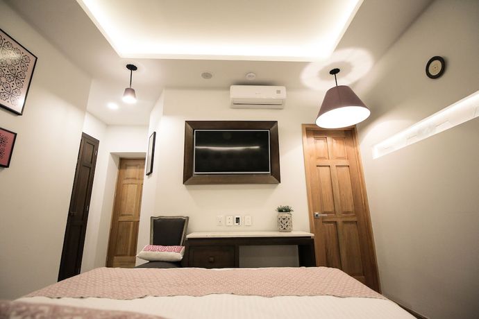 Imagen de la habitación del Hotel Casa Rosa Gran Boutique. Foto 11