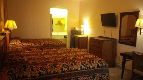 Imagen de la habitación del Hotel Casa Rosa Inn. Foto 3