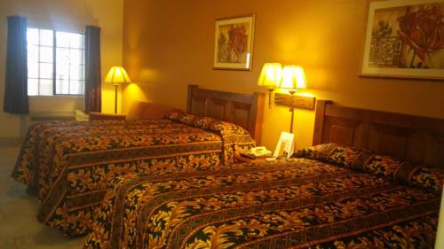 Imagen de la habitación del Hotel Casa Rosa Inn. Foto 6