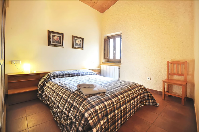 Imagen de la habitación del Hotel Casa Rural Can Simonet De Rocabruna. Foto 10