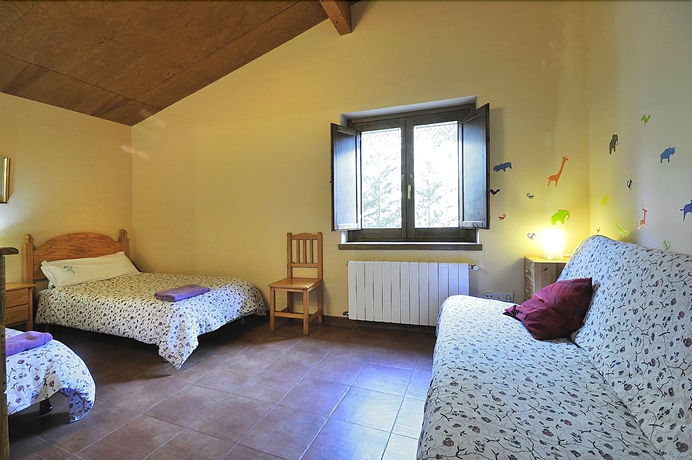 Imagen de la habitación del Hotel Casa Rural Can Simonet De Rocabruna. Foto 12