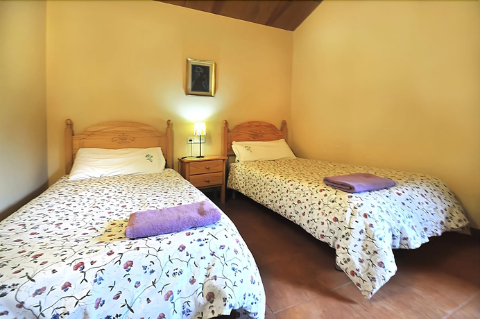 Imagen de la habitación del Hotel Casa Rural Can Simonet De Rocabruna. Foto 13