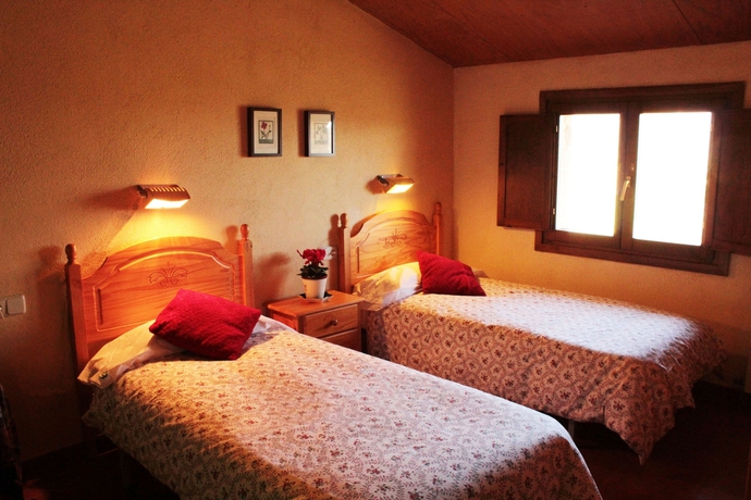 Imagen de la habitación del Hotel Casa Rural Can Simonet De Rocabruna. Foto 15