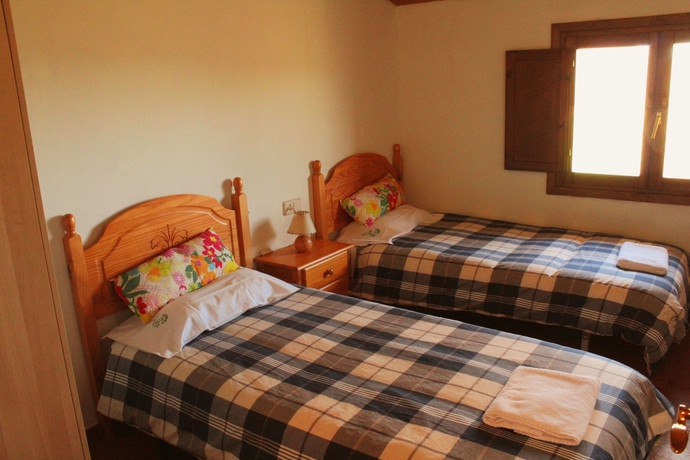 Imagen de la habitación del Hotel Casa Rural Can Simonet De Rocabruna. Foto 16