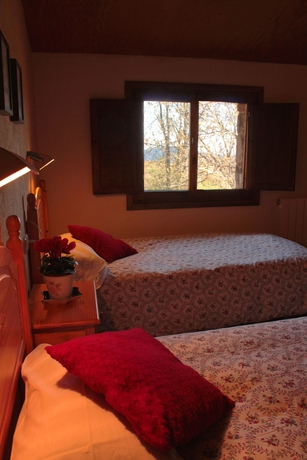 Imagen de la habitación del Hotel Casa Rural Can Simonet De Rocabruna. Foto 17