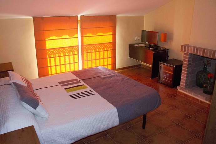 Imagen de la habitación del Hotel Casa Rural Magnanimus. Foto 7