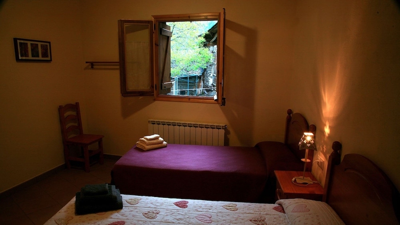 Imagen de la habitación del Hotel Casa Rural l'Hort del Metge. Foto 11