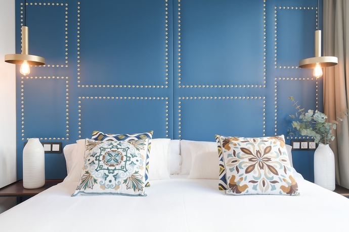 Imagen de la habitación del Hotel Casa Sevilla 1920 Suites By Época. Foto 2