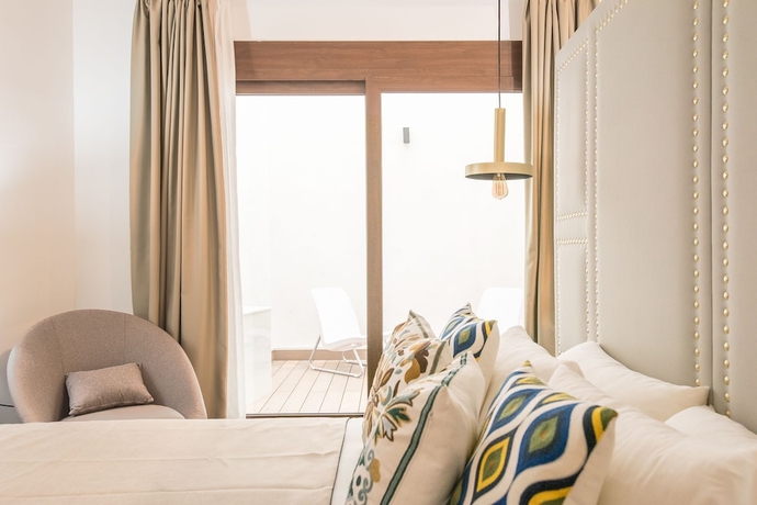 Imagen de la habitación del Hotel Casa Sevilla 1920 Suites By Época. Foto 4