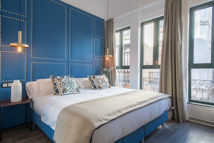 Imagen de la habitación del Hotel Casa Sevilla 1920 Suites By Época. Foto 8