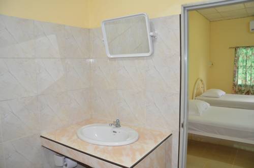 Imagen de la habitación del Hotel Casa Theresa Resort and Garden. Foto 2