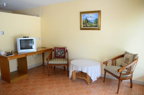 Imagen de la habitación del Hotel Casa Theresa Resort and Garden. Foto 7