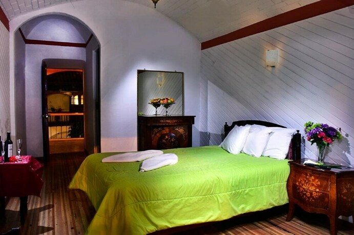 Imagen de la habitación del Hotel Casa Tisoc. Foto 14