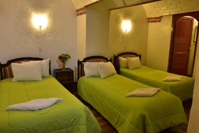 Imagen de la habitación del Hotel Casa Tisoc. Foto 16