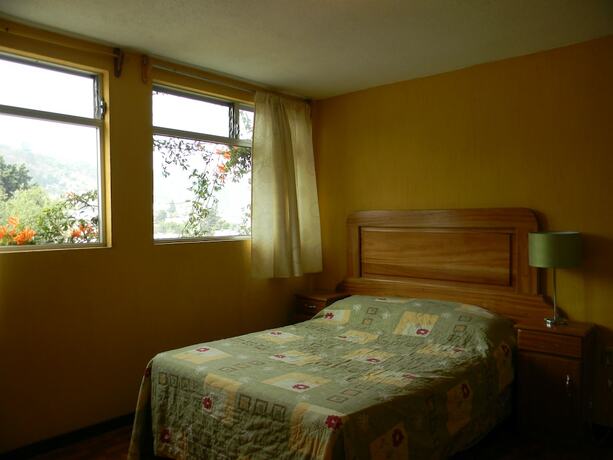 Imagen de la habitación del Hotel Casa Xelaju. Foto 11