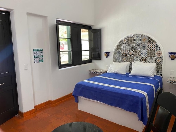 Imagen de la habitación del Hotel Casa Yollotzin. Foto 5