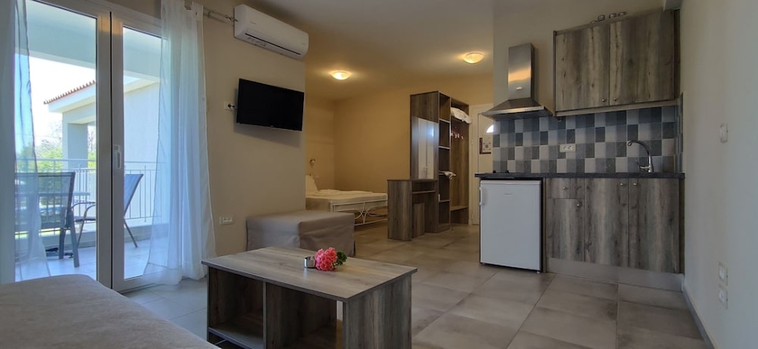 Imagen de la habitación del Hotel Casa de Rosa Apartments. Foto 11