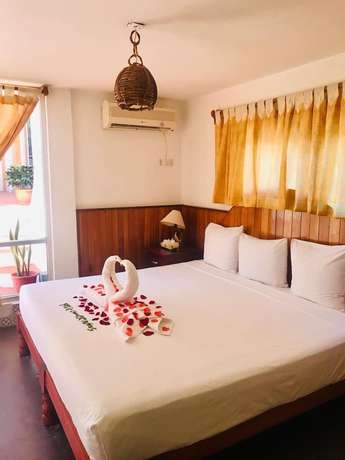 Imagen de la habitación del Hotel Casa de la Palma Bed and Breakfast. Foto 14