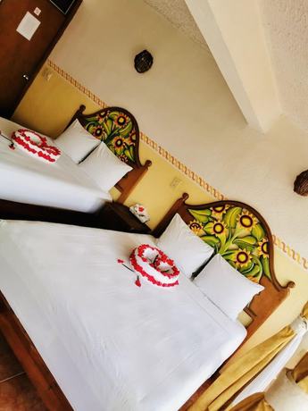 Imagen de la habitación del Hotel Casa de la Palma Bed and Breakfast. Foto 15
