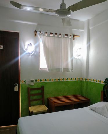 Imagen de la habitación del Hotel Casa de la Palma Bed and Breakfast. Foto 16