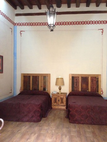 Imagen de la habitación del Hotel Casa de la Palma Travel. Foto 2