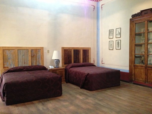 Imagen de la habitación del Hotel Casa de la Palma Travel. Foto 6