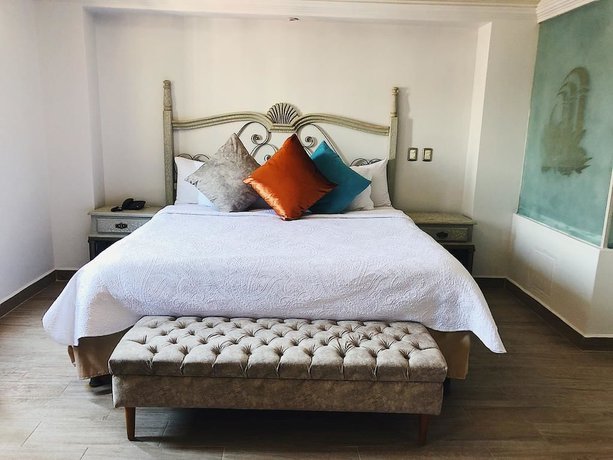 Imagen de la habitación del Hotel Casa de los Angeles. Foto 15