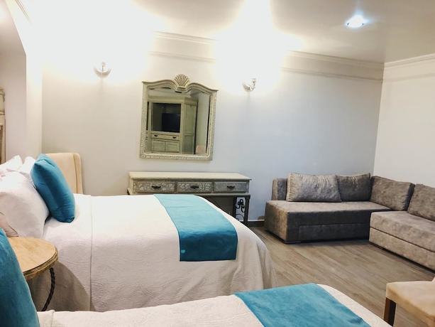 Imagen de la habitación del Hotel Casa de los Angeles. Foto 17