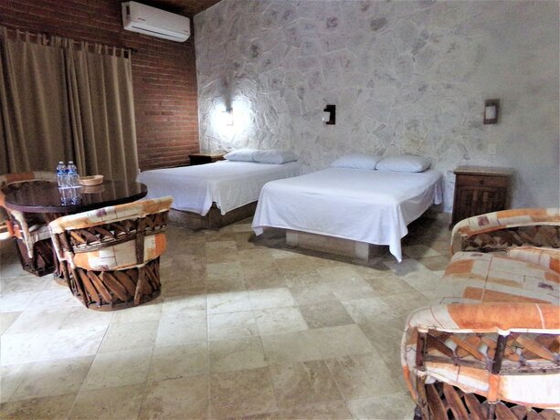 Imagen de la habitación del Hotel Casa del Lirio Diamante. Foto 16