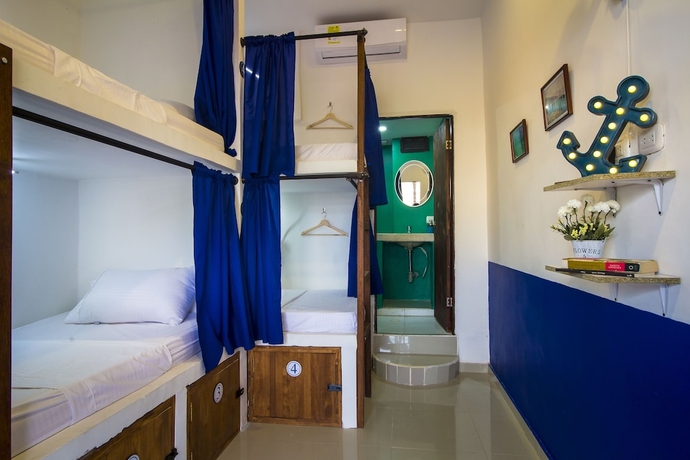 Imagen de la habitación del Hotel Casa del Puerto Hostel and Suites. Foto 4