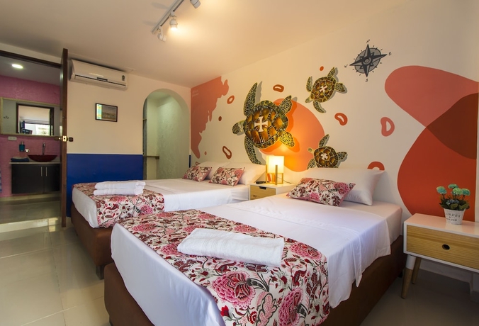 Imagen de la habitación del Hotel Casa del Puerto Hostel and Suites. Foto 6