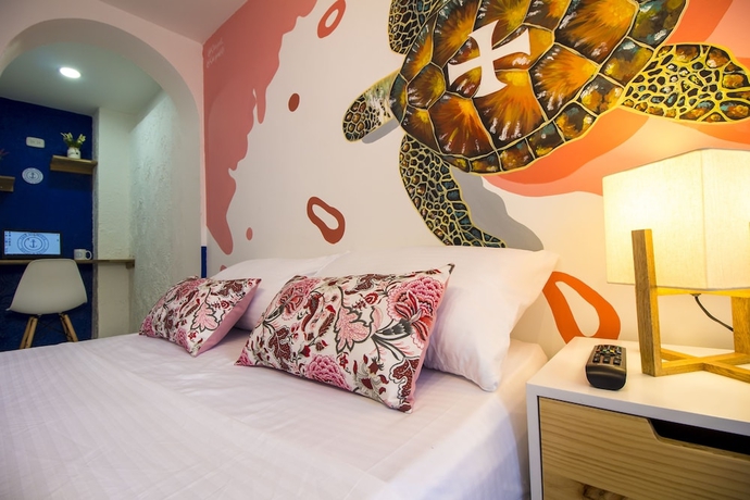 Imagen de la habitación del Hotel Casa del Puerto Hostel and Suites. Foto 9
