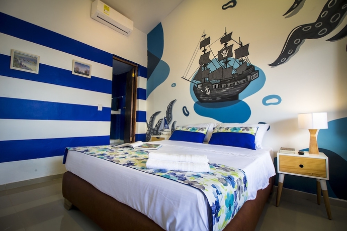 Imagen de la habitación del Hotel Casa del Puerto Hostel and Suites. Foto 15