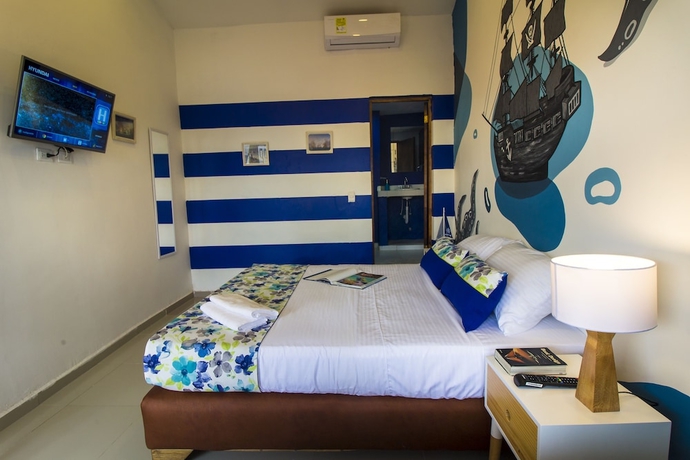 Imagen de la habitación del Hotel Casa del Puerto Hostel and Suites. Foto 16