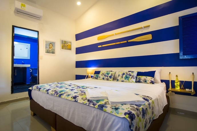 Imagen de la habitación del Hotel Casa del Puerto Hostel and Suites. Foto 17