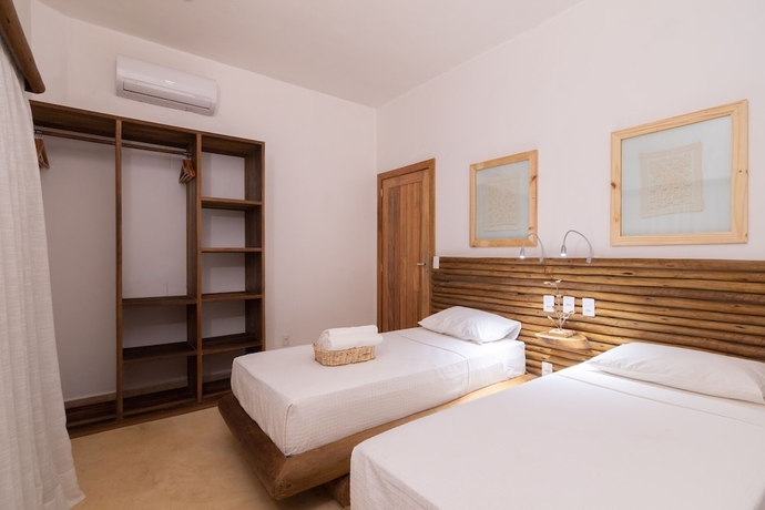 Imagen de la habitación del Hotel CasaLô. Foto 10