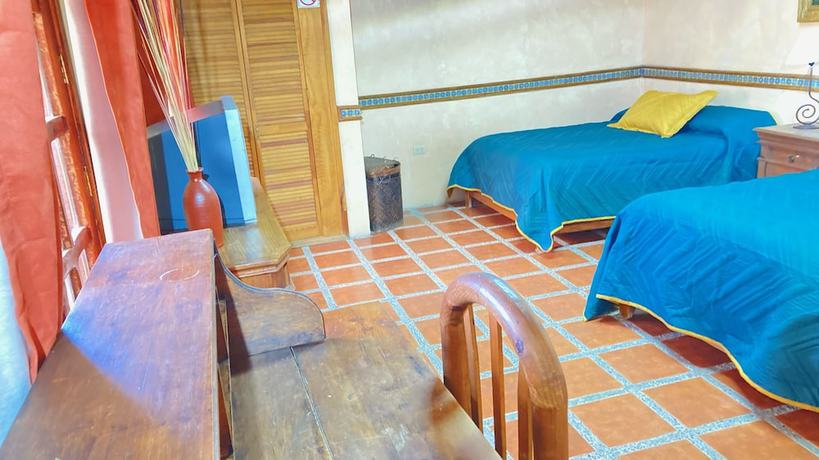 Imagen de la habitación del Hotel CasaMia. Foto 8