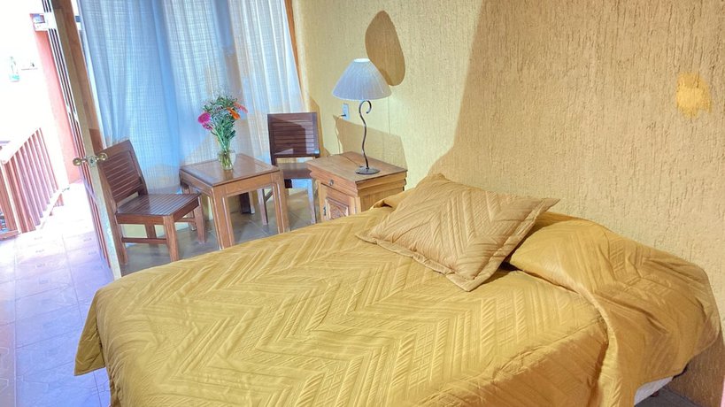 Imagen de la habitación del Hotel CasaMia. Foto 11