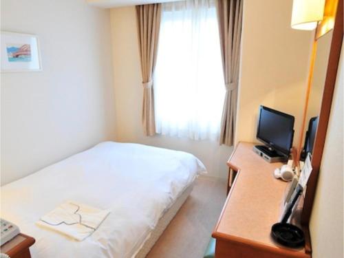 Imagen de la habitación del Hotel Casabella Inn Kobe. Foto 8