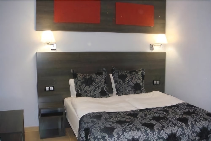 Imagen de la habitación del Hotel Casablanca Suites. Foto 7