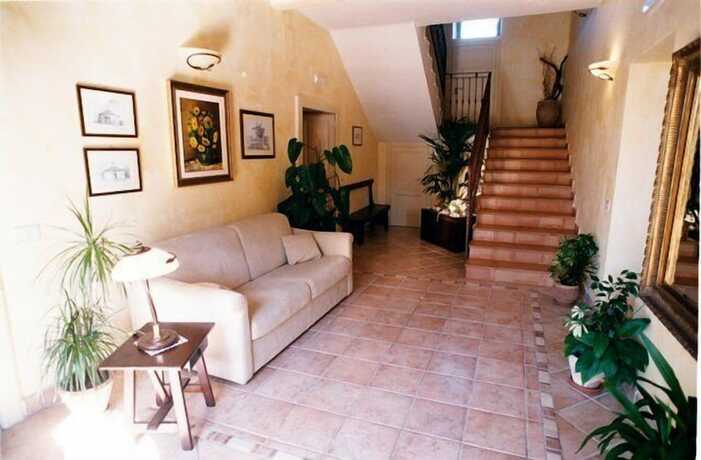 Imagen de la habitación del Hotel Casale 900. Foto 16