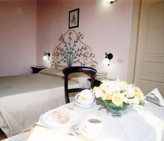 Imagen de la habitación del Hotel Casale 900. Foto 17