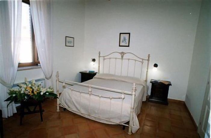 Imagen de la habitación del Hotel Casale 900. Foto 19