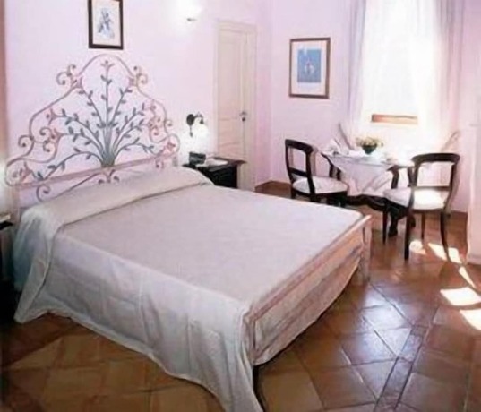 Imagen de la habitación del Hotel Casale 900. Foto 20